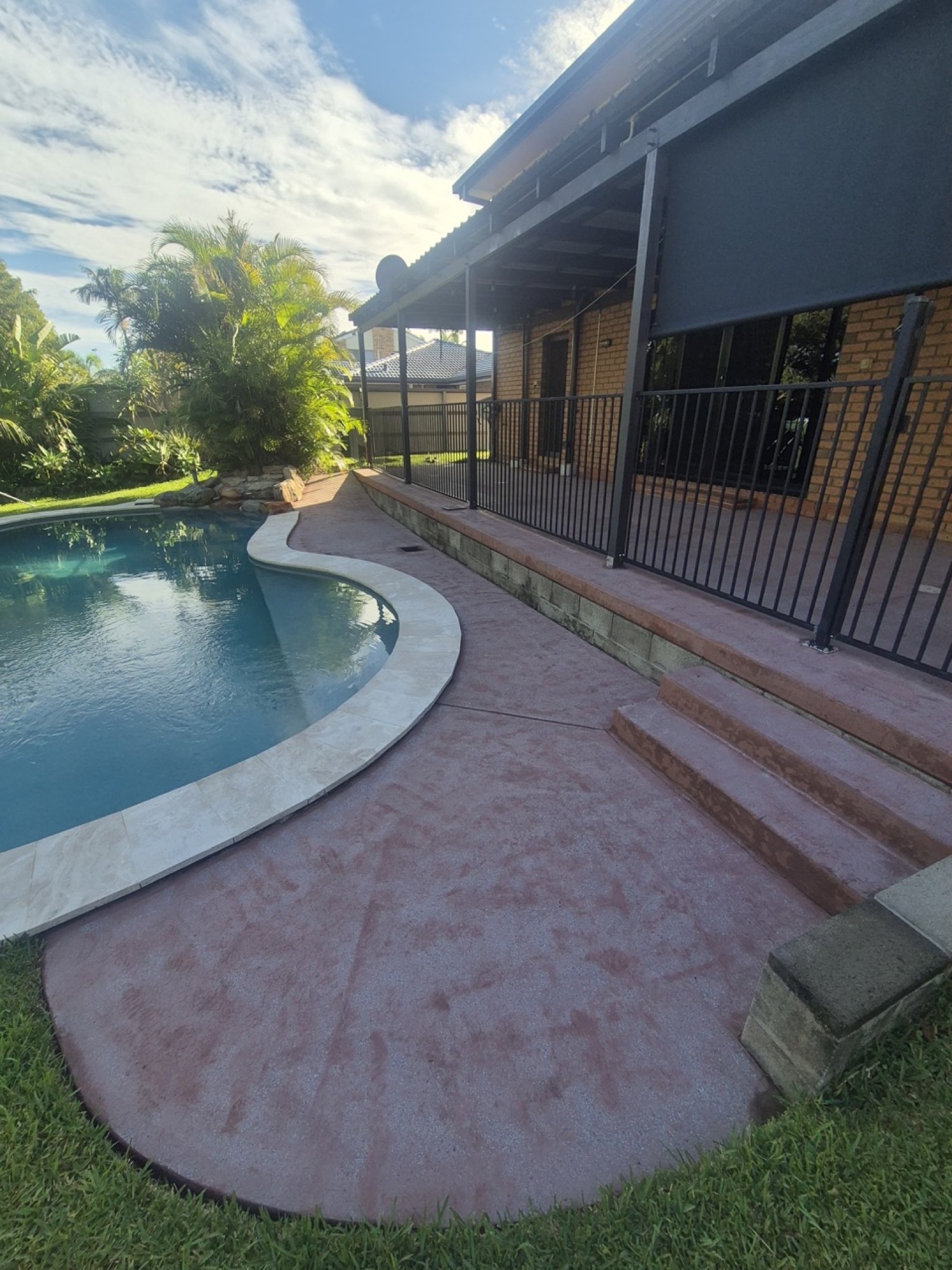 Before: worn pool area concrete
