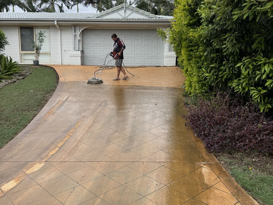 Pressure cleaning a stencilled driveway before sealing