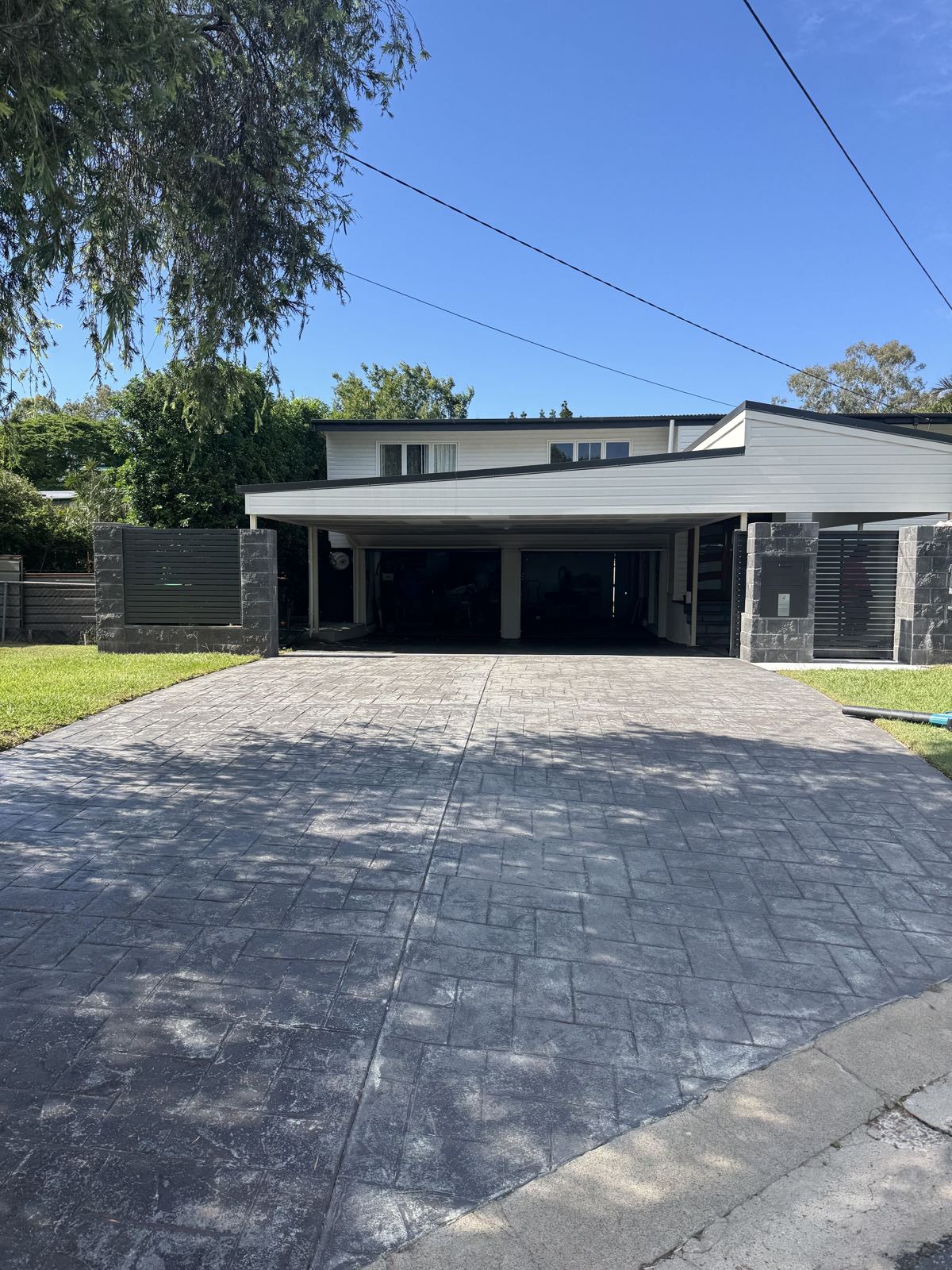 Before: Faded stencilled driveway